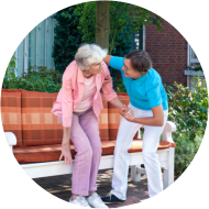 Care assistant tending to a senior lady